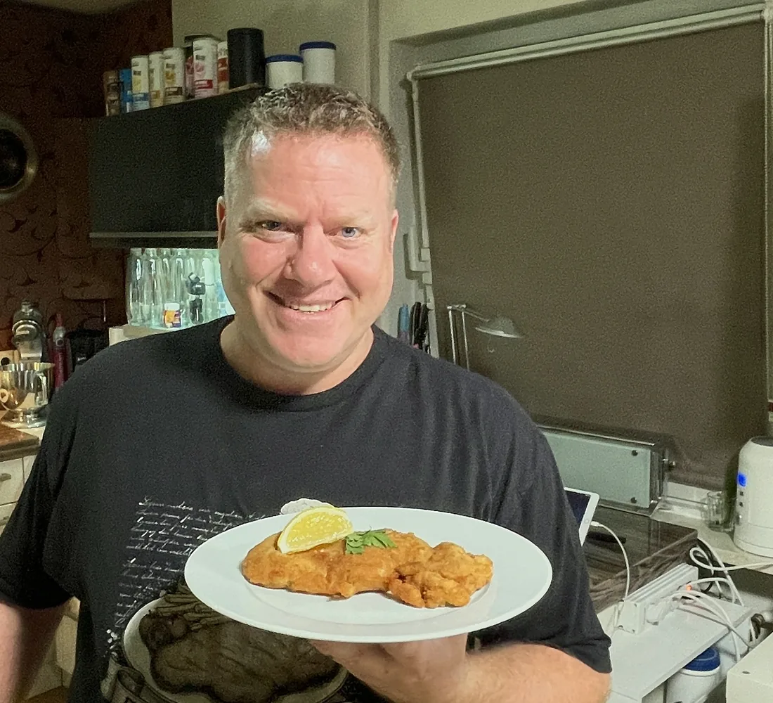 Flo with a plate of Cracker Schnitzel