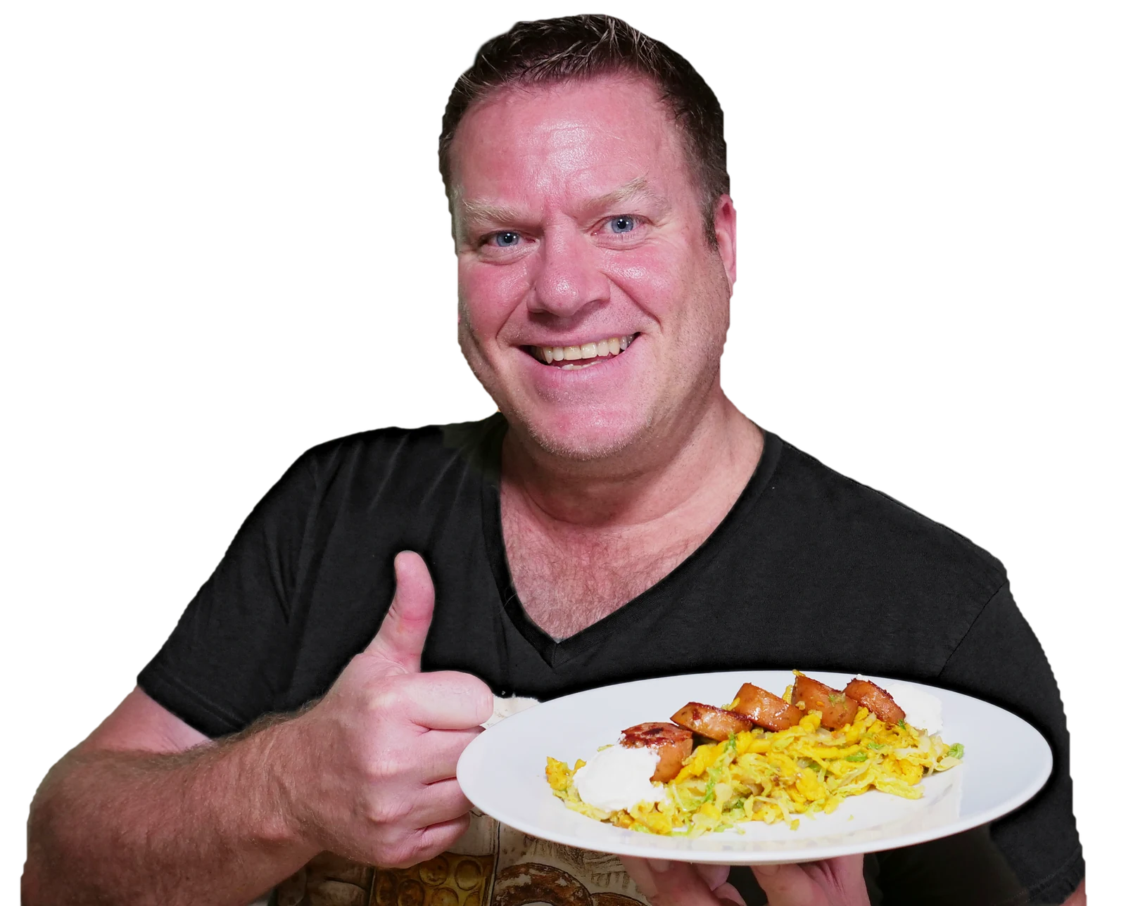 Flo with a plate of pumpkin Spätzle stir fry, giving a thumbs up